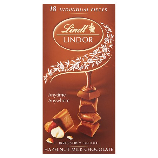 Lindt Lindor Mléčná čokoláda s jemnou náplní a drcenými lískovými ořechy 100g