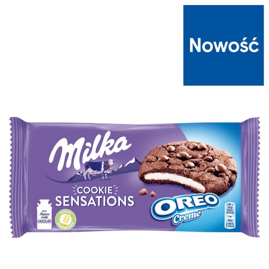 Milka Cookie Sensations Ciastka kakaowe z kawałkami czekolady i nadzieniem o smaku waniliowym 156 g